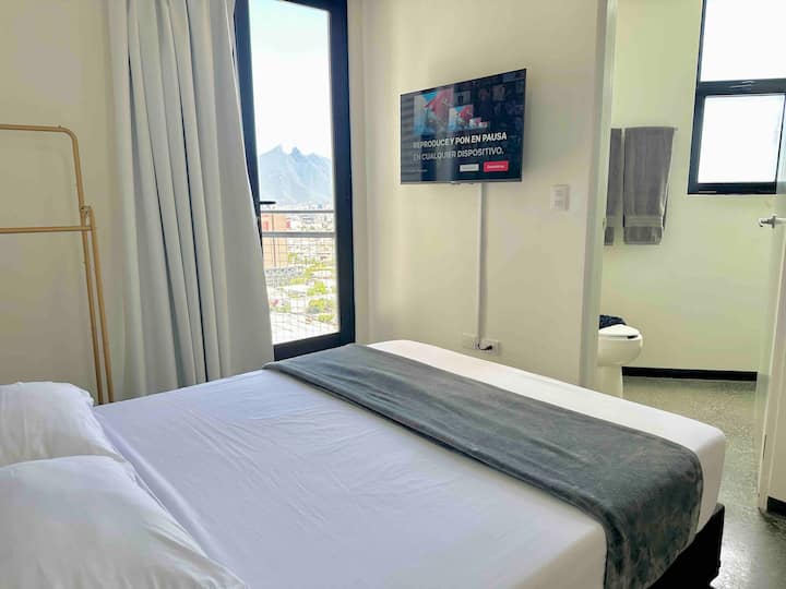 Comfortable and spacious bed. 