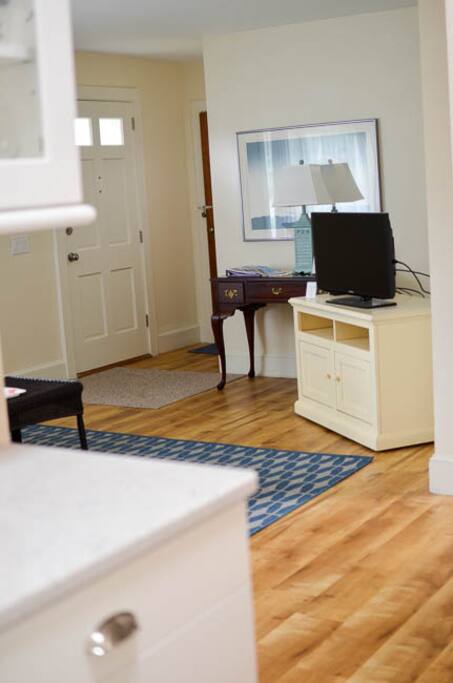View from kitchen into living room and front door.