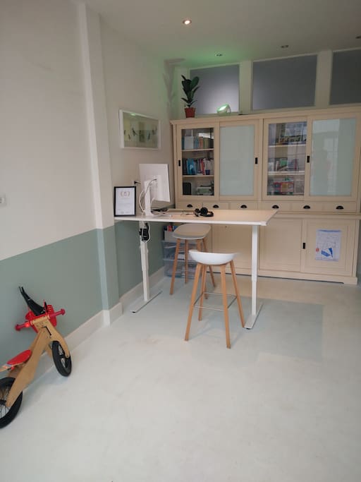 entrance with a desk, place for bikes or skateboards