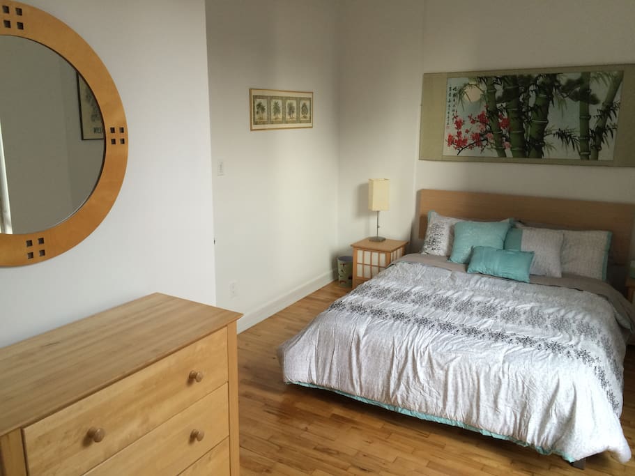 Guest Bedroom with dresser and mirror