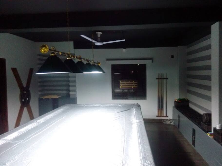 Game room has a full sized snooker table ambient lighting and a dartboard game!