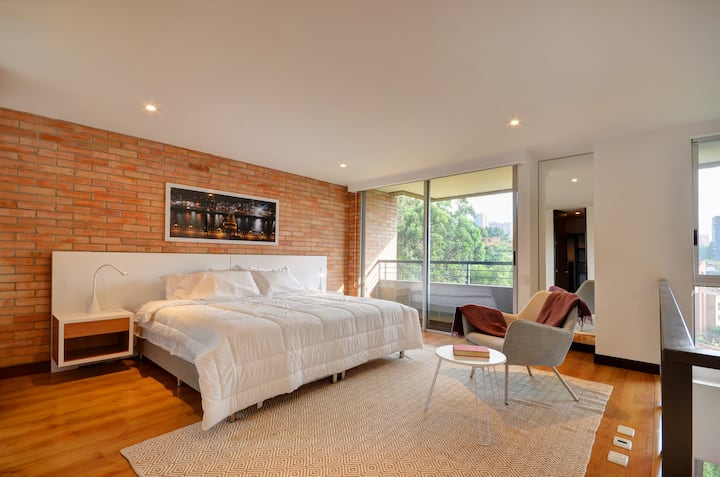 Specious and perfect master bedroom with king bed.