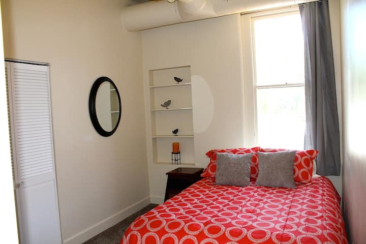 Guest bedroom with Queen bed overlooking Old Town Square 