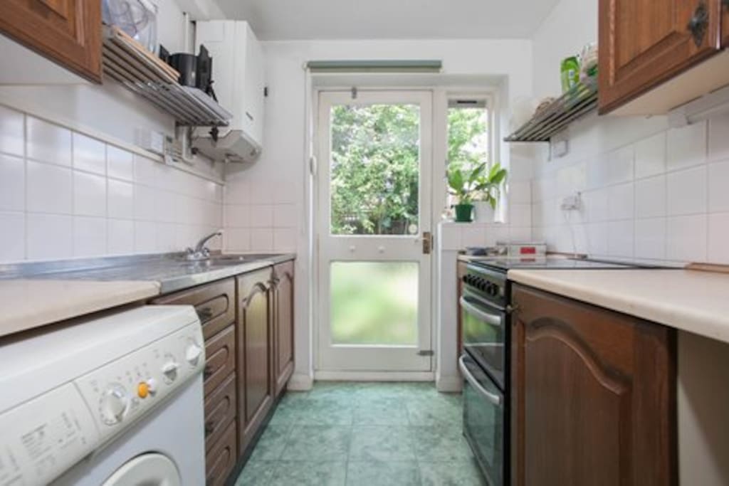 Kitchen with door to back garden