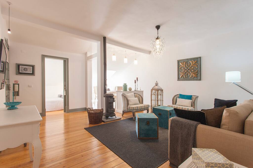 Spacious living room with AC and terrace.