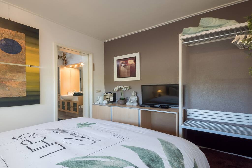 Light bedroom and an ensuite bathroom