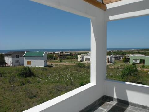 Panoramic view of the ocean and hills. PUNTA NEGRA