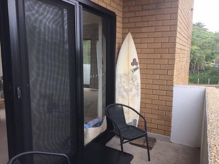 Balcony with small table and two chairs