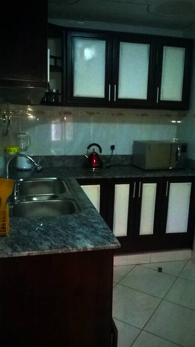 Kitchen with gas and electric stove