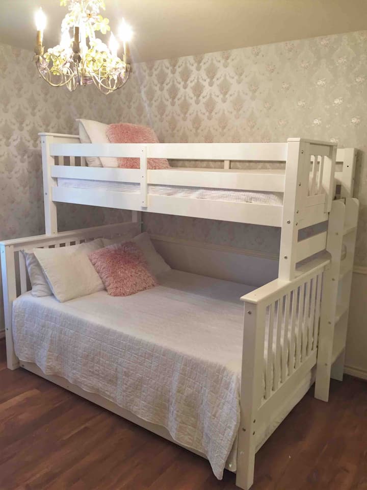 Got kids?  Need extra sleep space?
The third bedroom has a great bunk bed set.  There is twin bed on top.  The main bed is a full bed. There is also a pull out full trundle beneath!  Can sleep a total of 5 people.  **Top bunk weight limit is 150 lbs.