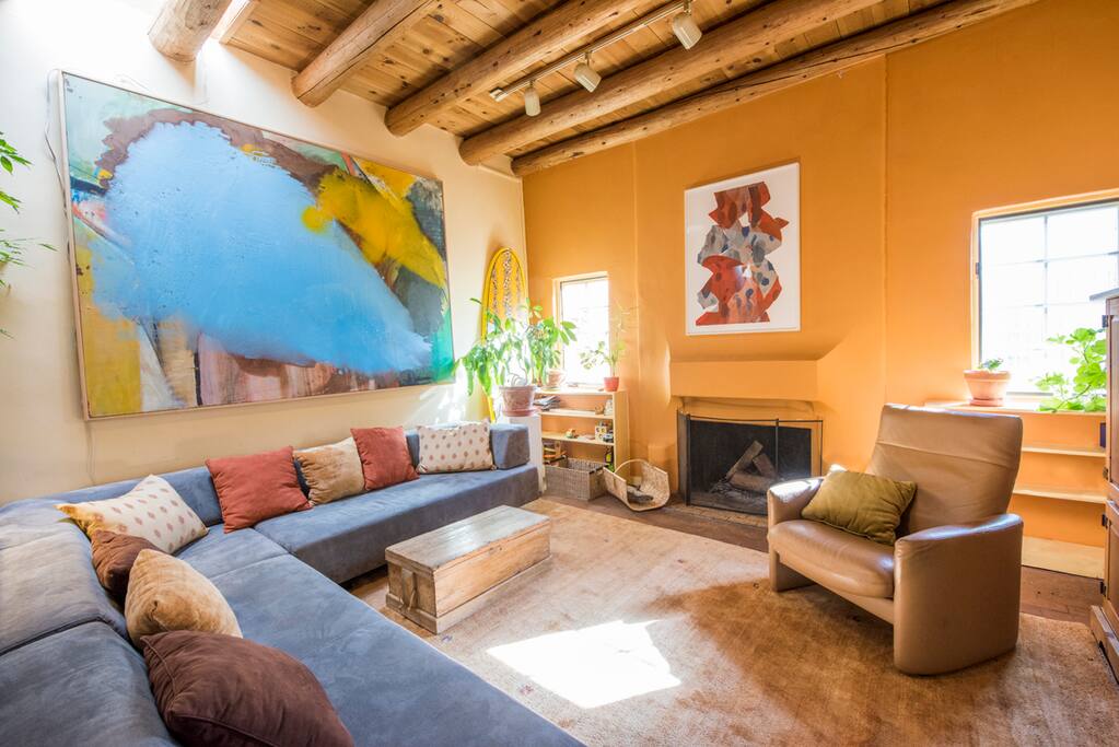 Living Room w/ fireplace, Sofa has removeable backs converts to two twin sized beds