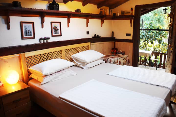 Inside the Treehouse, there's a double bed (Visco, 180x200)