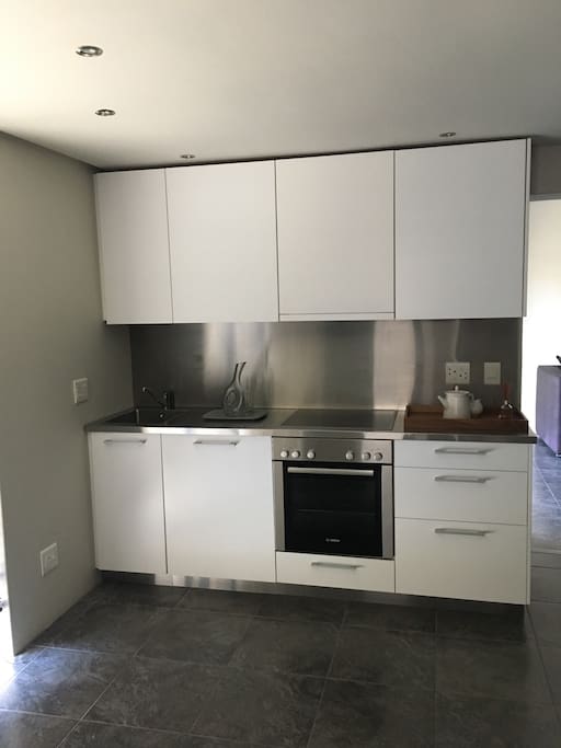 New fully equipped kitchen with washing machine , fridge and coffee machine