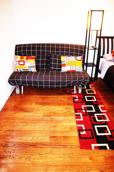 Futon easily rolls open to a full size bed, and rolls back closed to save space
