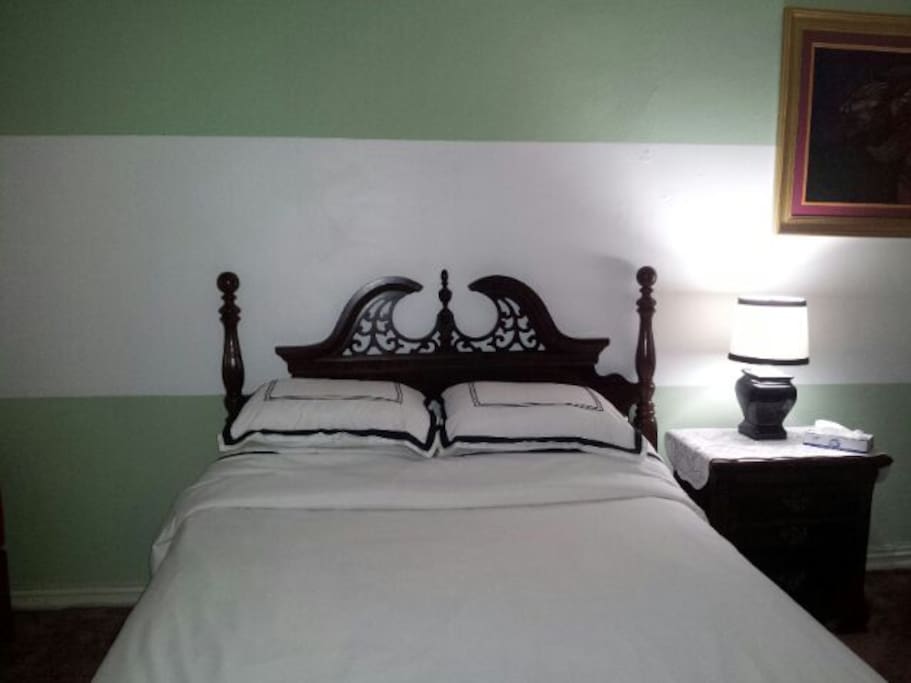Luxury microfiber bedding, cotton sheets and plenty of pillows. Additional bedside storage.