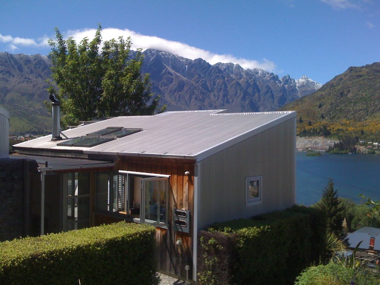 Beautiful private landscaped gardens with lake & mountain views