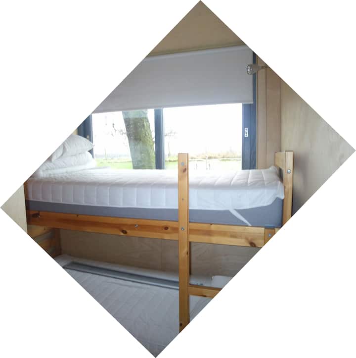 bunk bed in separate room on garden side, overlooking pool and garden