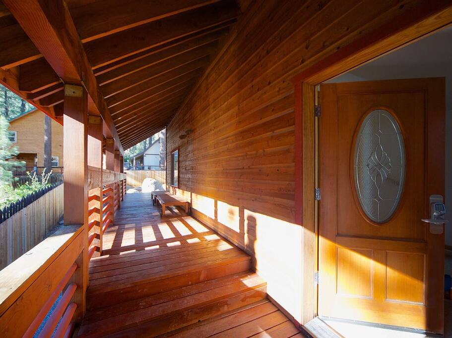 Covered entry with direct access to backyard.