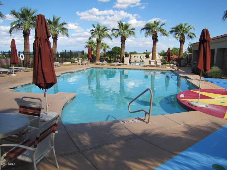 Sun tan and relax by the play pool