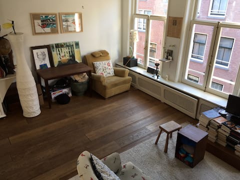Successful Airbnb property: Light Bohemian Penthouse, 2,5 floors, city heart in Jordaan