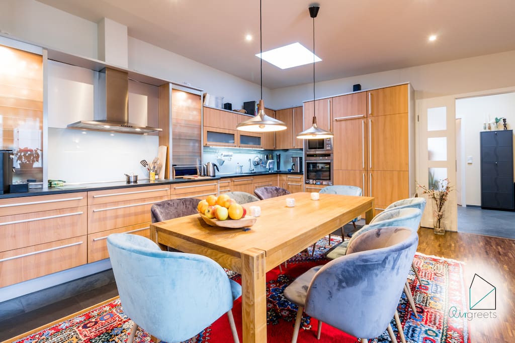 The dining room offers a big table to enjoy your homecooked meals.