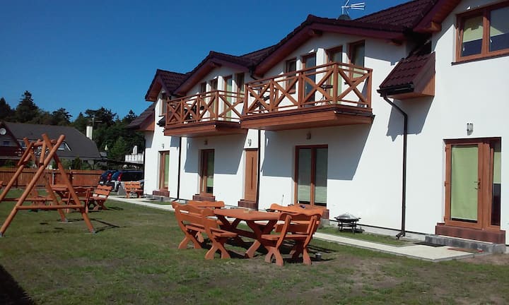 Double room in a house by the sea Sosenka