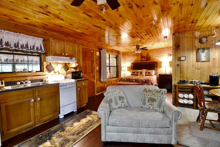 The kitchen is fully functional, so you can cook for your dear, then relax with them after in the loveseat before enjoying the hot tub!