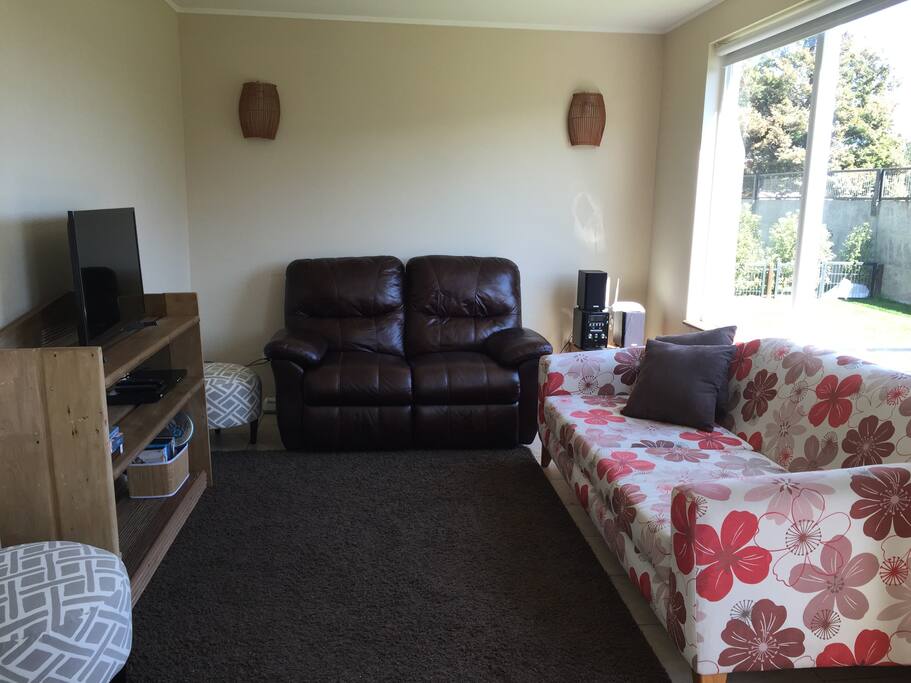 Fully equipped Living room with armchairs, smart tv, DVD and stereo