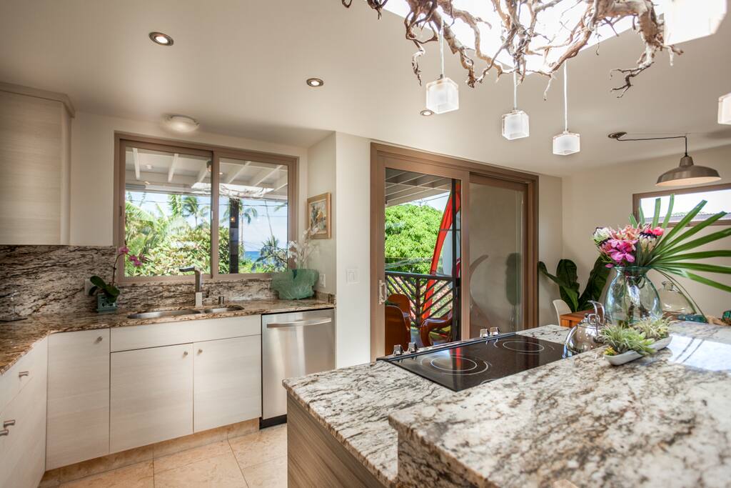 Indoor outdoor dining, kitchen and lanai