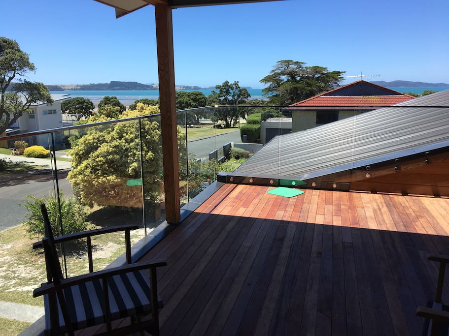 sit on the balcony or walk to the beach