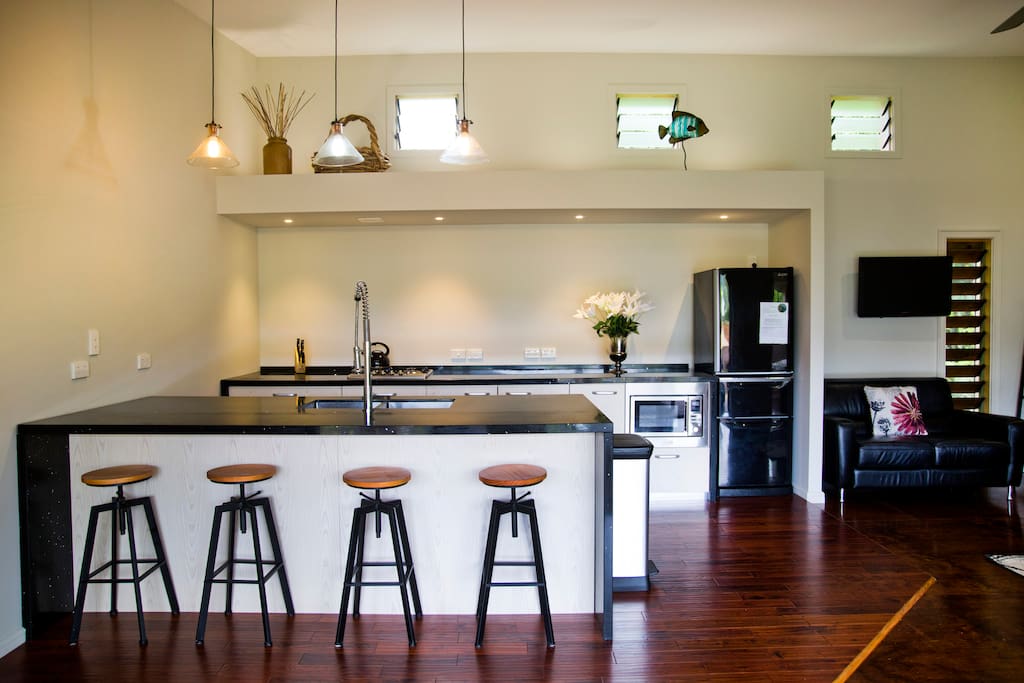 Double sink,large granite benches & breakfast bar