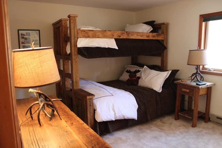 Bedroom has  Twin over Queen Bunk Bed that can sleep 3 people.  We can add an Airbed for additional guests with an extra charge.