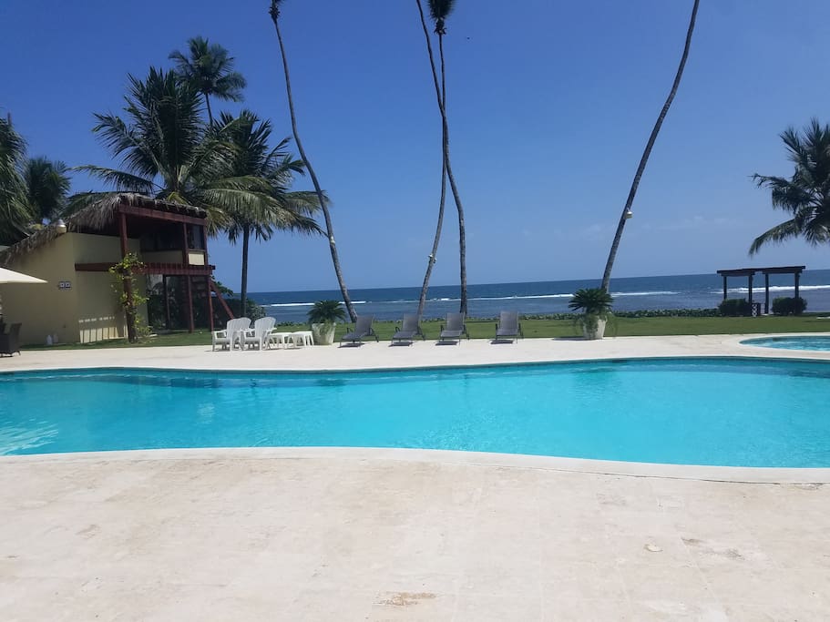 Beautiful and quite pool and jacuzzi with private beach front