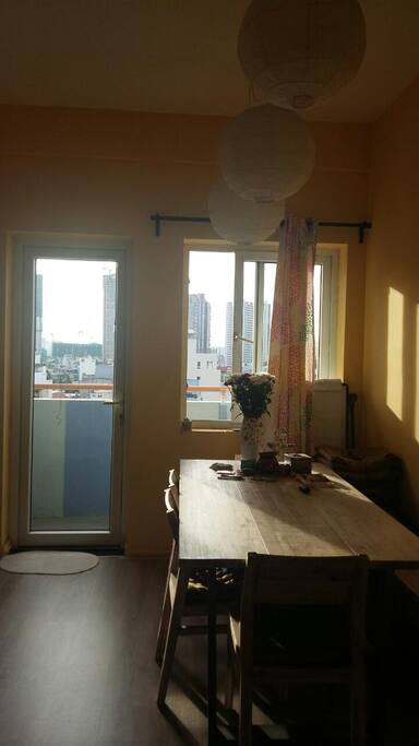The long table in the living and the small balcony view in the morning.