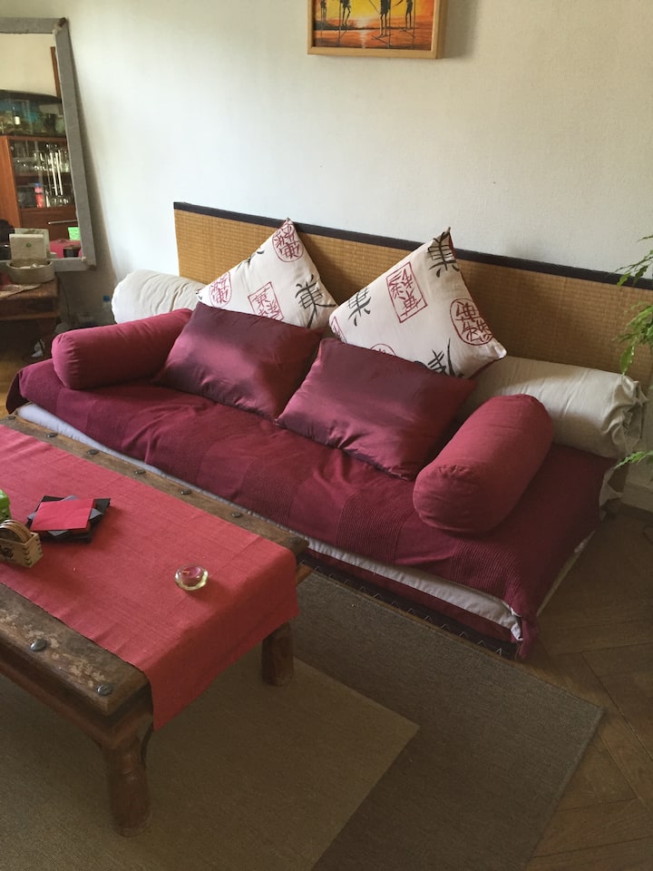 Futon bed in the living room in the city center Apartments for Rent