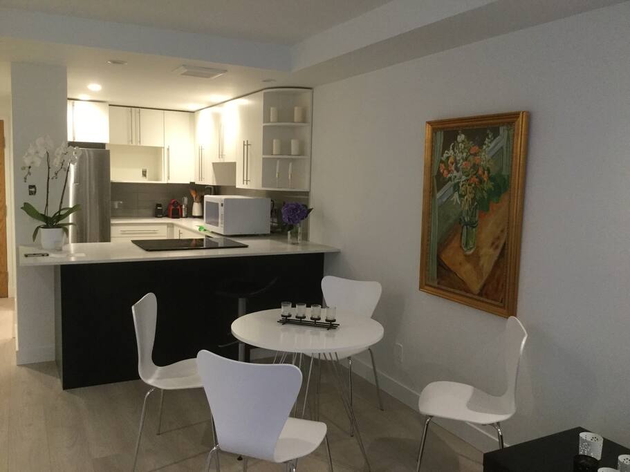 State of the art kitchen. Stainless steel appliances, dishwasher, microwave, full,y equipped with dishes, cutlery, herbs, etc