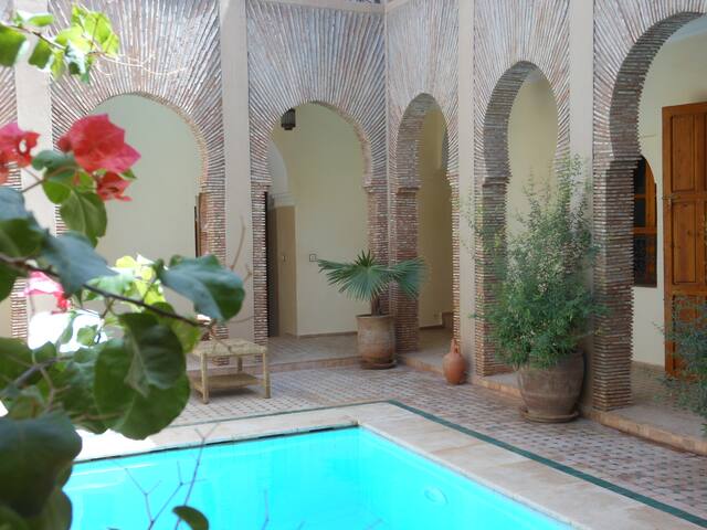 OUT OF THE TUMULUM OF MARRAKECH