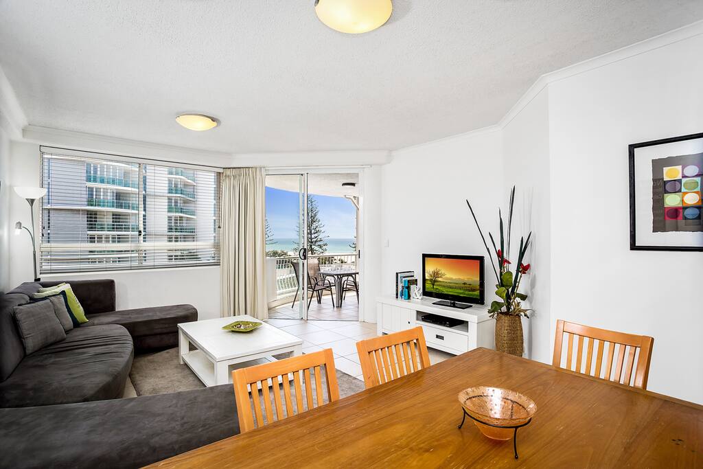 Spacious living area with pool or ocean views