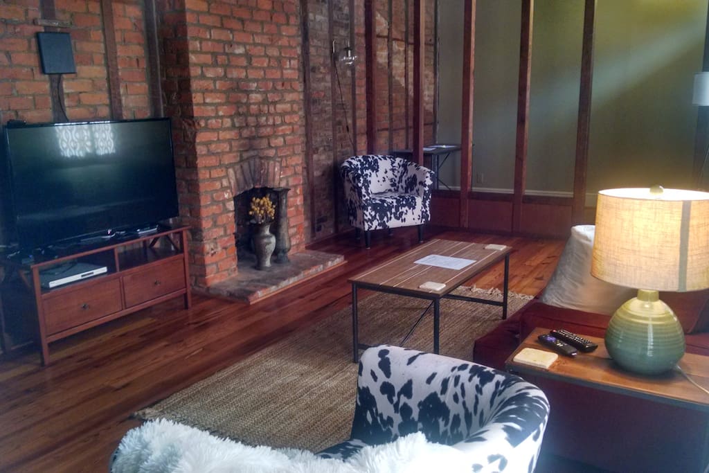 Living room with big tv and roku