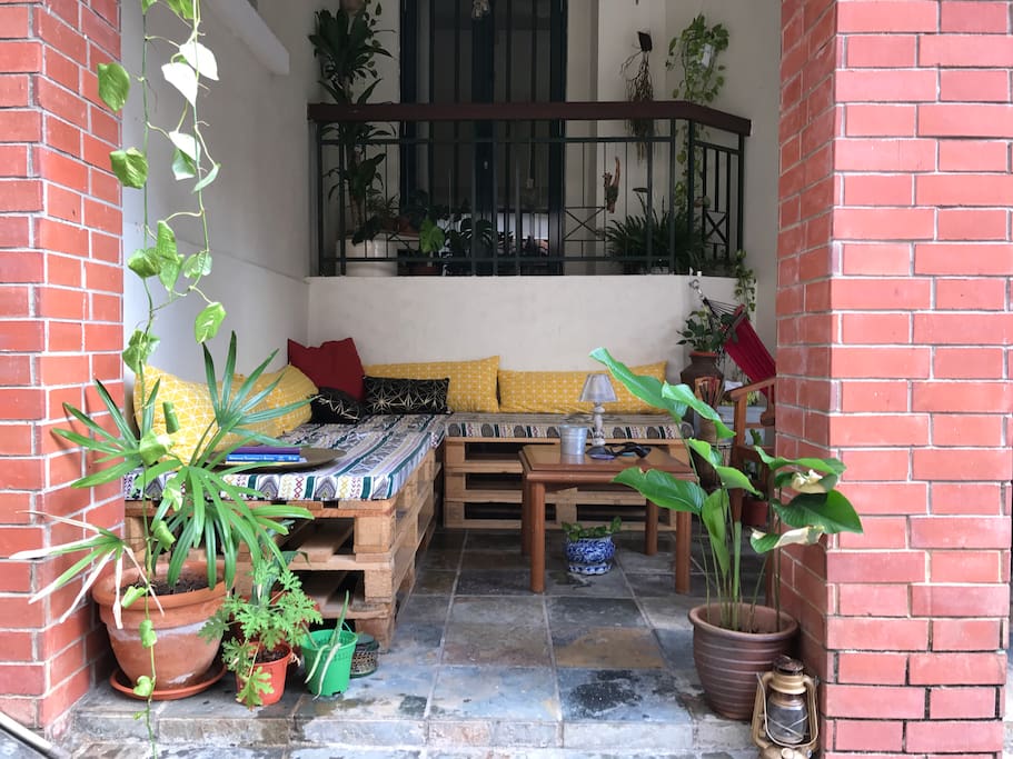 Outdoor patio where you can enjoy a cigarette or coffee while reading a book.