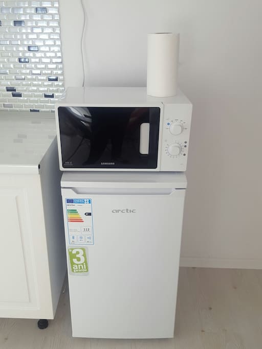 A microwave from samsung for fast eating and a refrigerator to cool down a botle of water or beverage!