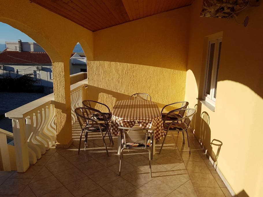 Terrace (smoking allowed). Big grill at disposal, shared for all guests.