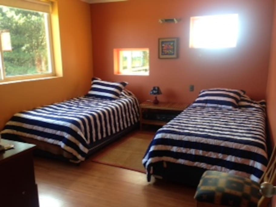 Two double beds with slide out mattresses for two more people.