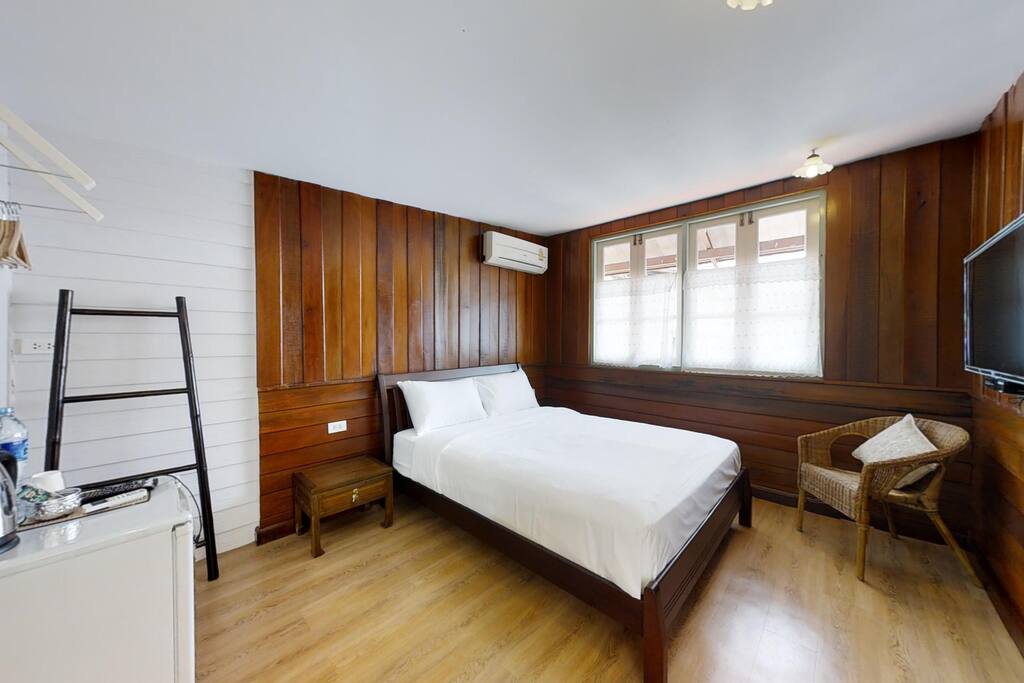 The Upper Deck bedroom with amenities and private bathroom