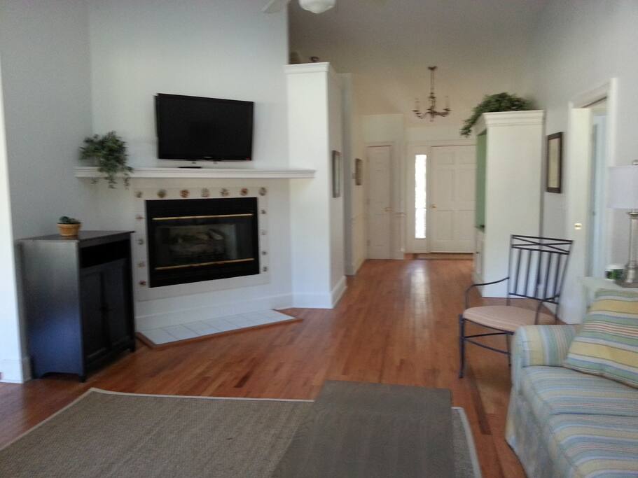 Front Entry showing TV and Fireplace