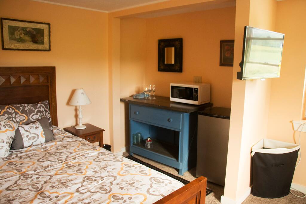 Microwave, coffee maker and mini fridge provided.