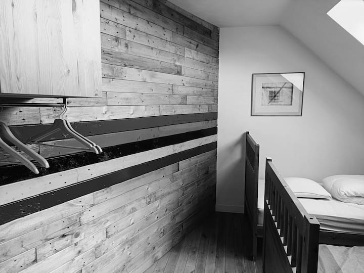 Storage cabinet and clothes hangers available.