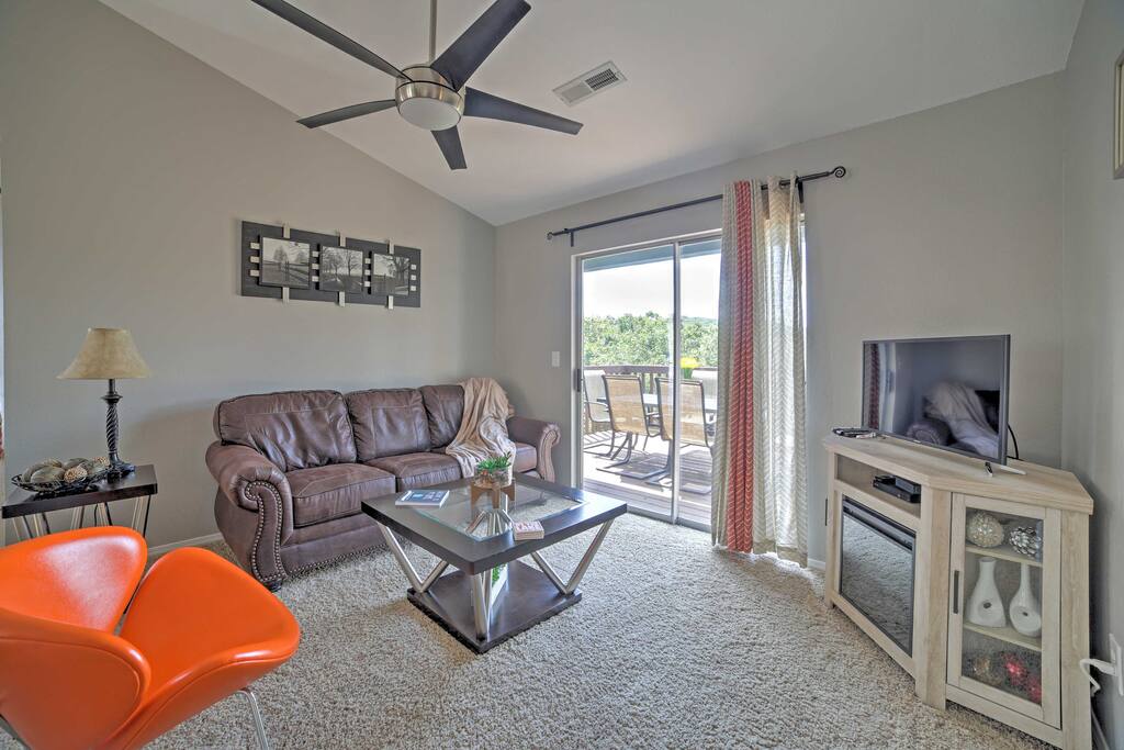 The leather couch in the living room pulls out into a queen-sized bed.