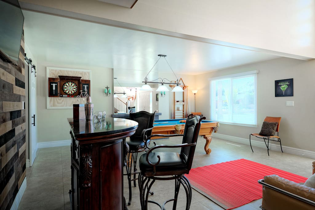 Bar area with darts and pool table