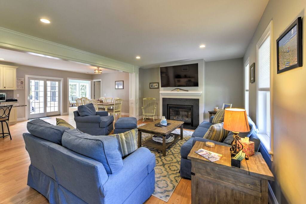 Inside, the home features hardwood floors, numerous windows and tasteful decor.